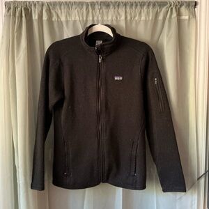 Patagonia women’s Black Full-Zip Jacket with Stella artois patch on back size m
